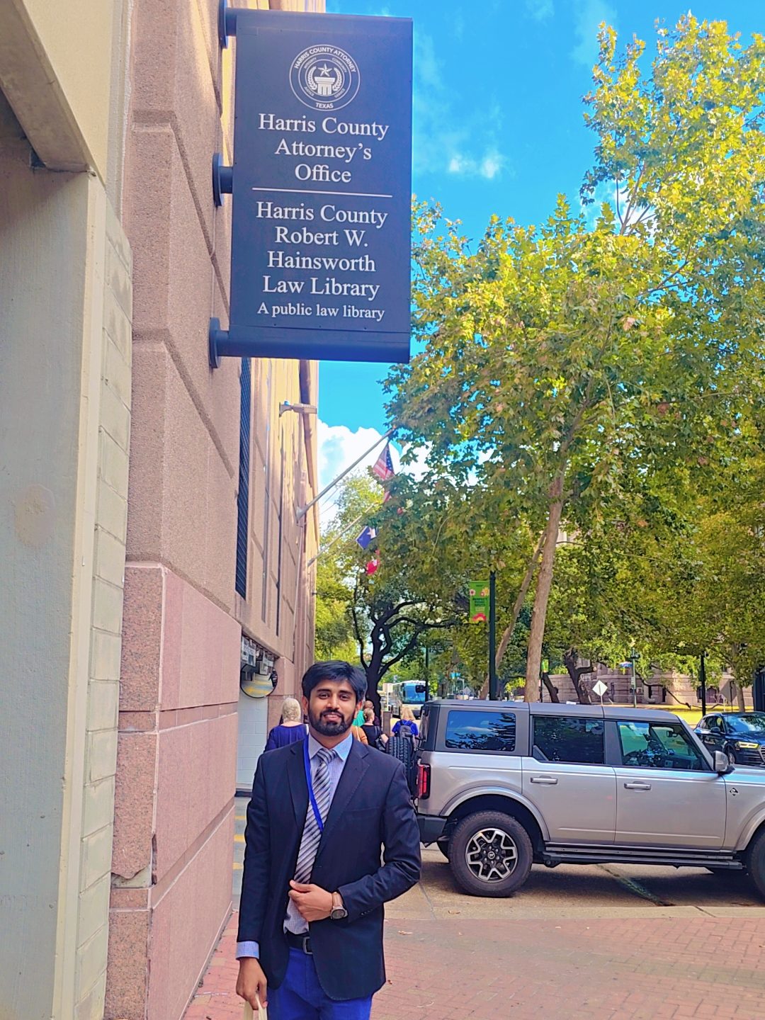 Photograph of Furkan Yousaf outside the Harris County Law Library